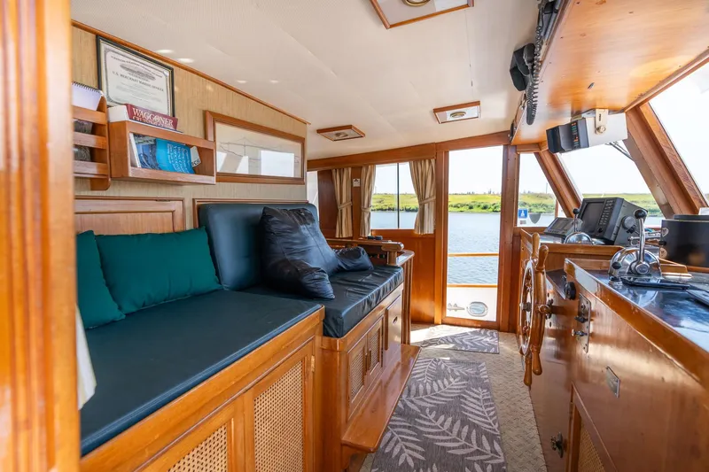 Slide: The Image of Interior of a 1976 Grand Banks 52 Europa yacht with wooden furnishings. - 43