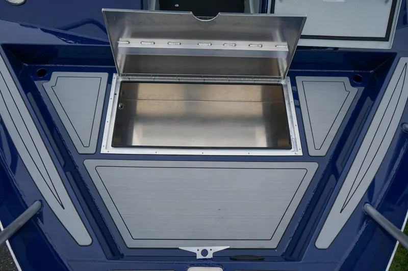 Slide: The Image of Open storage compartment on 2026 Weldcraft 260 Ocean King boat deck. - 19