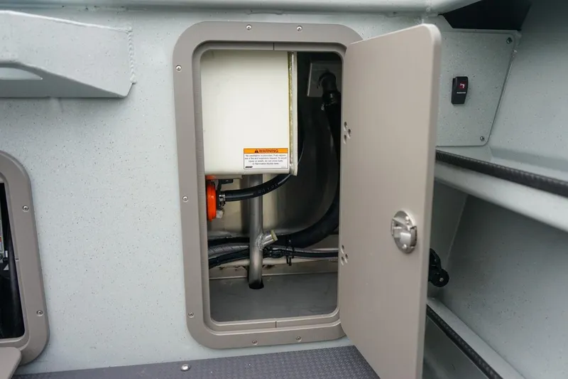 Slide: The Image of 2026 Weldcraft 260 Ocean King interior compartment with open access panel. - 6