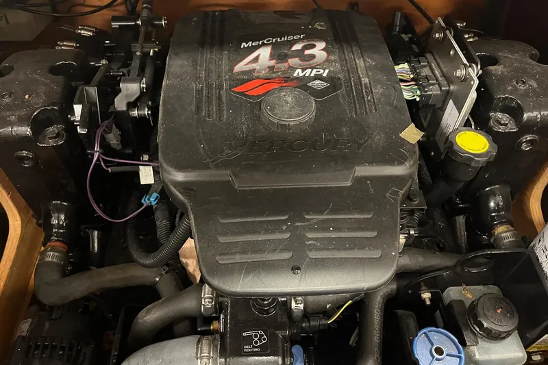 Slide: The Image of MerCruiser 4.3 MPI engine in a 2006 Skiff Craft 24' Runabout boat. - 29