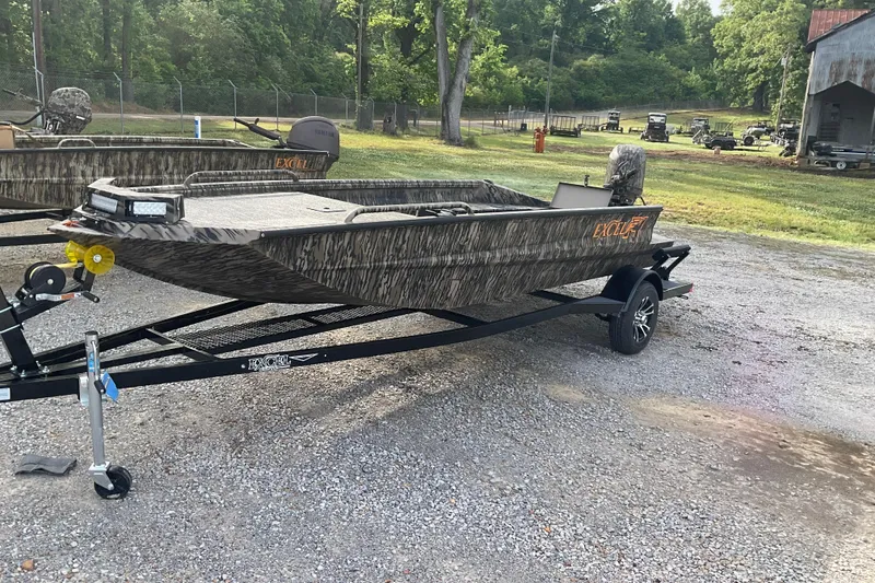 The Image of 2026 Excel 1751 Viper F4 boat on trailer, camo design, parked outdoors. - 0