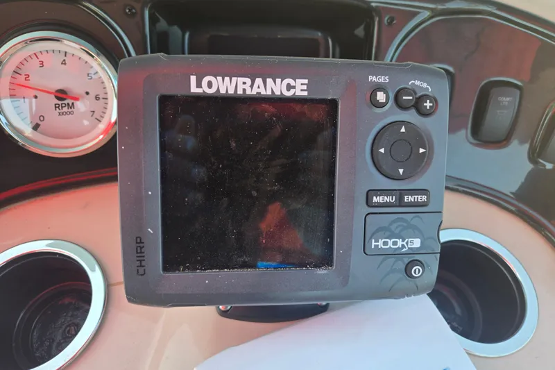 Slide: The Image of Lowrance Hook 5 fish finder on 2017 Sun Tracker Party Barge 18 DLX dashboard. - 11