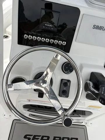 Slide: The Image of Steering console of Sea Pro 2026 202 Center Console boat. - 14