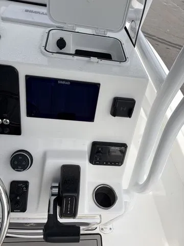 Slide: The Image of 2026 Sea Pro 202 Center Console dashboard with Simrad display. - 15