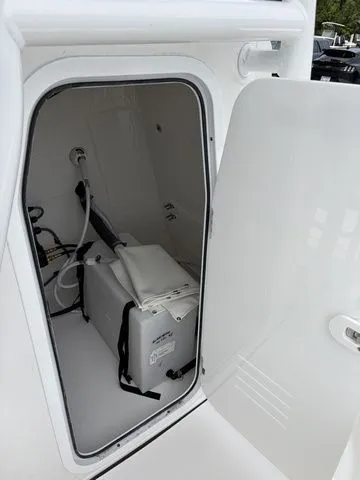 Slide: The Image of Interior of Sea Pro 202 Center Console 2026 with storage space. - 16