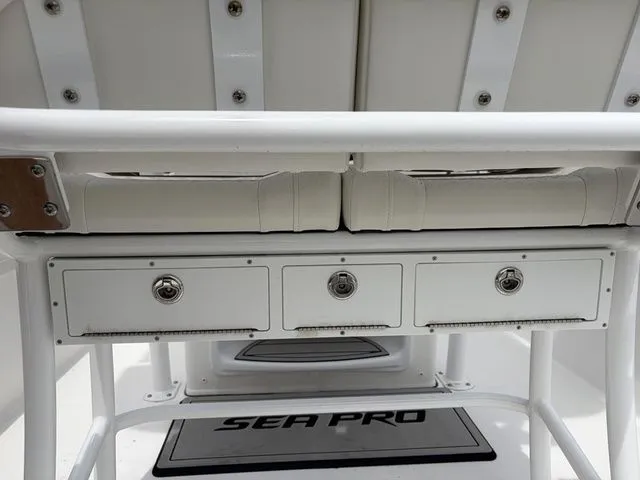 Slide: The Image of 2026 Sea Pro 202 Center Console with storage and seating. - 19