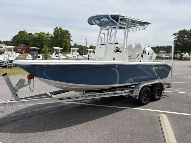 Slide: The Image of 2026 Sea Pro 202 Center Console boat on trailer outdoors. - 3
