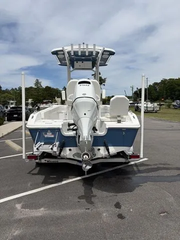 Slide: The Image of 2026 Sea Pro 202 Center Console boat in parking lot, rear view. - 5