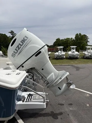 Slide: The Image of 2026 Sea Pro 202 Center Console with Suzuki outboard motor. - 8