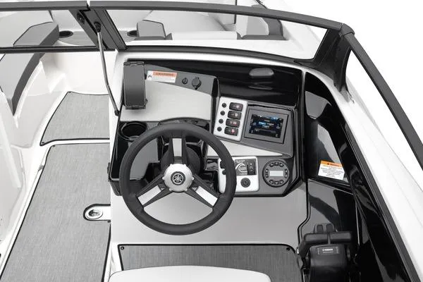 Slide: The Image of 2026 Yamaha Boats AR220 dashboard with steering wheel and control panel. - 4