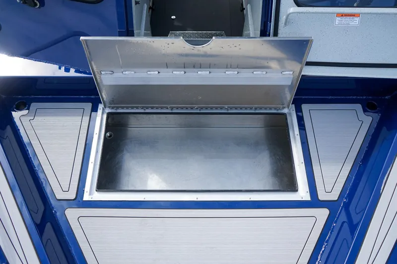 Slide: The Image of Open storage compartment on 2026 Weldcraft 220 Ocean King boat deck. - 20