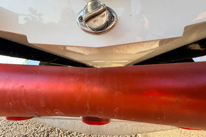 Slide: The Image of Close-up of 2025 Chittum Skiffs Islamorada 21 boat detail with red pipe. - 13