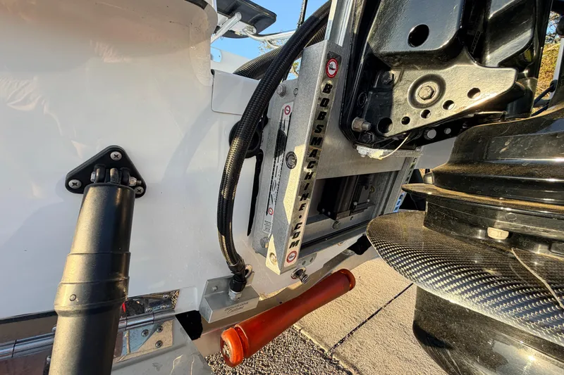 Slide: The Image of Close-up of 2025 Chittum Skiffs Islamorada 21 boat engine and components. - 14