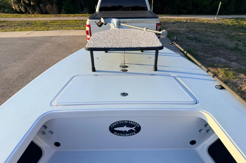 Slide: The Image of 2025 Chittum Skiffs Islamorada 21 boat deck with storage and poling platform. - 19