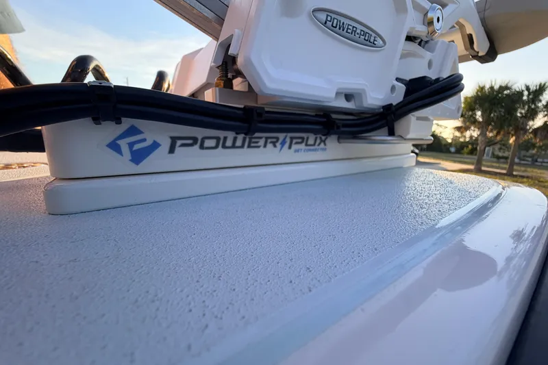 Slide: The Image of 2025 Chittum Skiffs Islamorada 21 featuring Power-Pole and Power-Pux system on deck. - 22