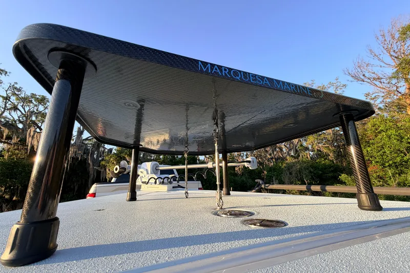 Slide: The Image of 2025 Chittum Skiffs Islamorada 21 boat with Marquesa Marine platform in scenic setting. - 28