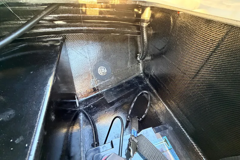 Slide: The Image of Interior view of 2025 Chittum Skiffs Islamorada 21, showcasing carbon fiber construction. - 37