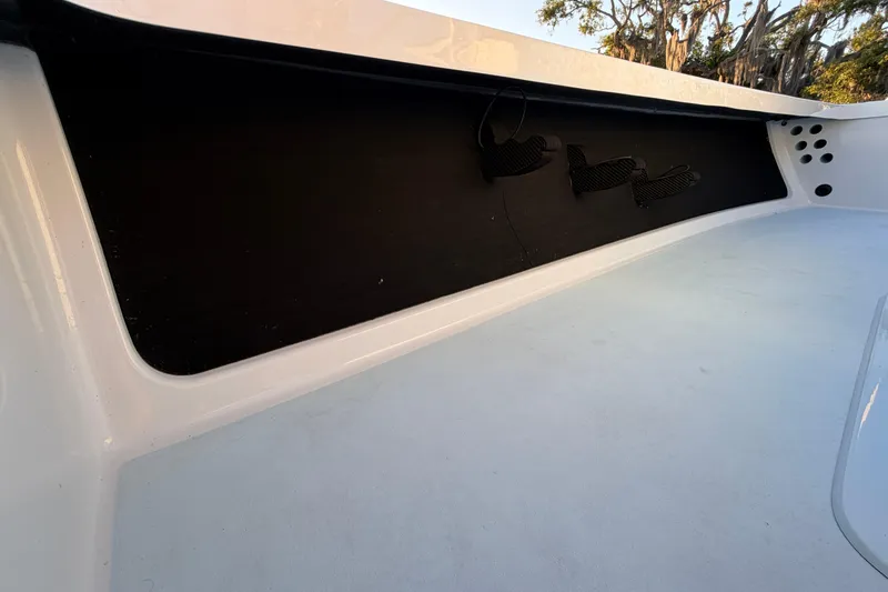 Slide: The Image of 2025 Chittum Skiffs Islamorada 21 interior detail, featuring sleek design and storage space. - 40