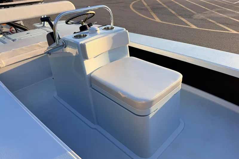 Slide: The Image of 2025 Chittum Skiffs Islamorada 21 boat interior with steering console and seating. - 42