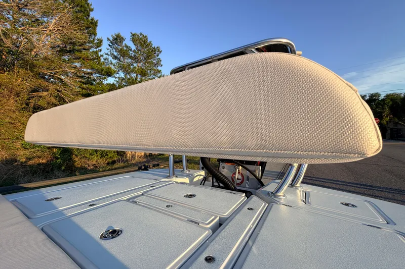 Slide: The Image of 2025 Chittum Skiffs Islamorada 21 boat with cushioned seating and storage compartments. - 60