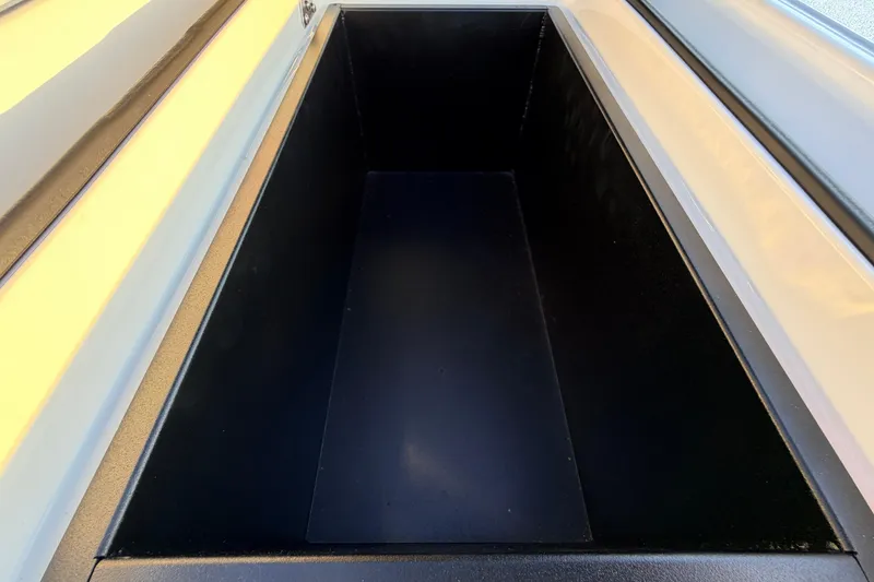 Slide: The Image of Storage compartment of 2025 Chittum Skiffs Islamorada 21 boat, interior view. - 69