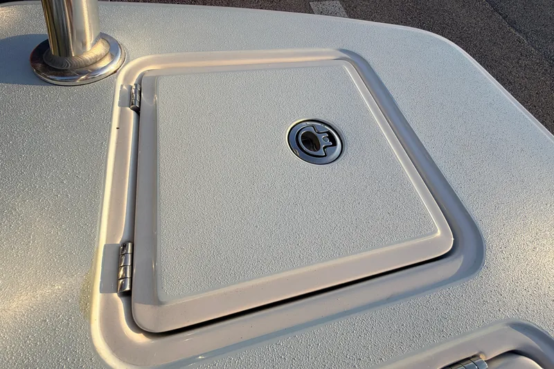 Slide: The Image of 2025 Chittum Skiffs Islamorada 21 hatch detail with stainless steel hardware. - 70