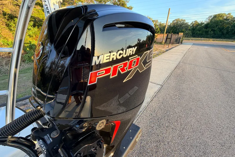 Slide: The Image of 2025 Chittum Skiffs Islamorada 21 with Mercury Pro XS engine on a sunny day. - 79