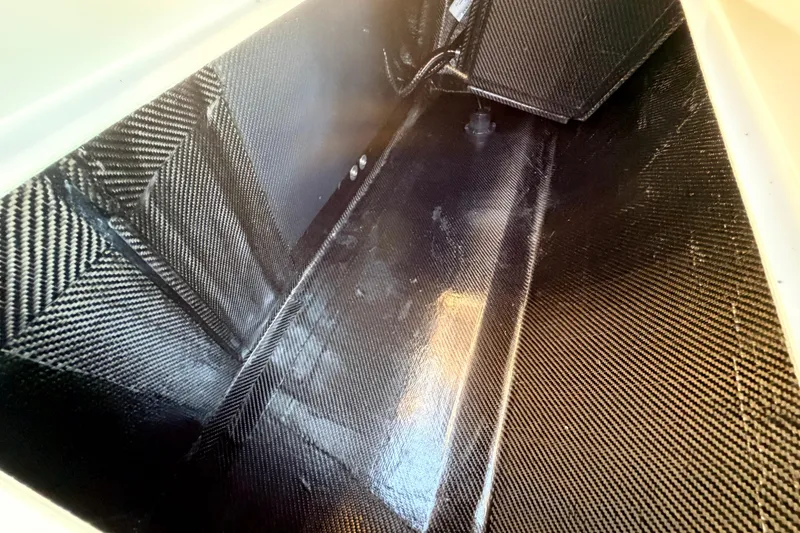 Slide: The Image of Interior view of 2025 Chittum Skiffs Islamorada 21, showcasing carbon fiber construction. - 84