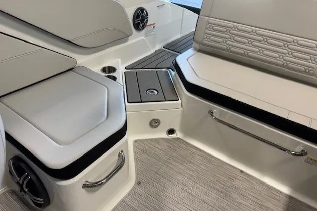 Slide: The Image of Interior of 2026 Sea Ray SPX 210 boat, featuring sleek seating and modern design elements. - 14