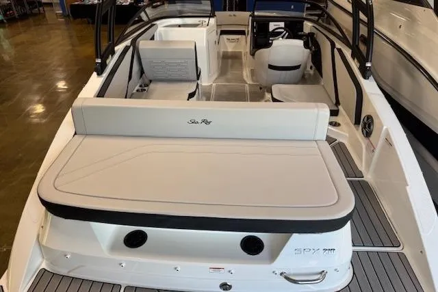 Slide: The Image of 2026 Sea Ray SPX 210 boat interior with seating and sleek design. - 4