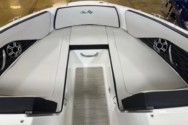 Slide: The Image of 2026 Sea Ray SPX 210 boat interior with sleek seating and modern design. - 6