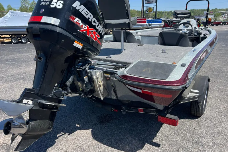 Slide: The Image of 2015 Stratos 186 VLO boat with Mercury Pro XS engine, parked outdoors. - 5