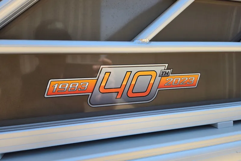 Slide: The Image of Sun Tracker SportFish 20 DLX 40th Anniversary logo, 1983-2023, celebrating 40 years. - 4