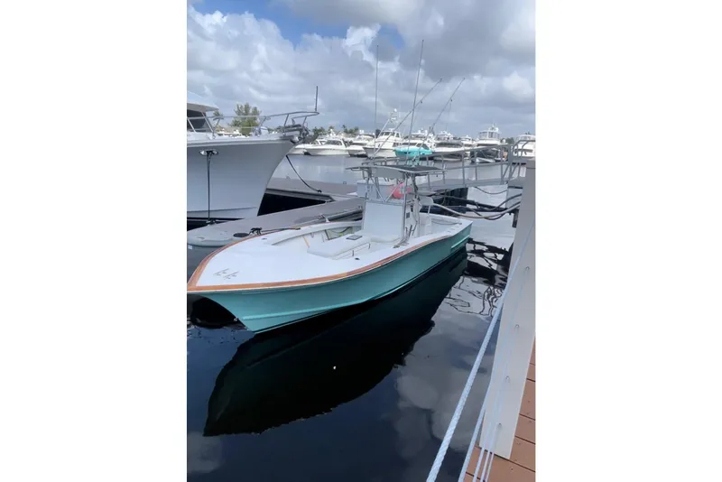 Slide: The Image of Control panel of a 1977 Scarborough 27 CC boat with navigation and communication equipment. - 12