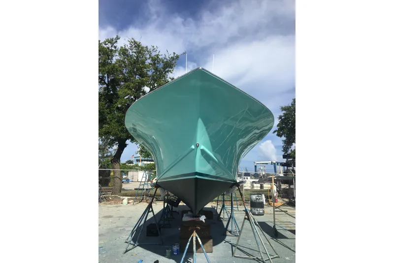 Slide: The Image of 1977 Scarborough 27 CC boat helm with steering wheel and control panel. - 13