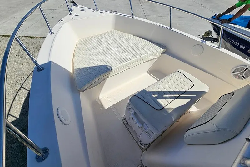 Slide: The Image of 2008 Key West 2020 Center Console boat interior with cushioned seating. - 14