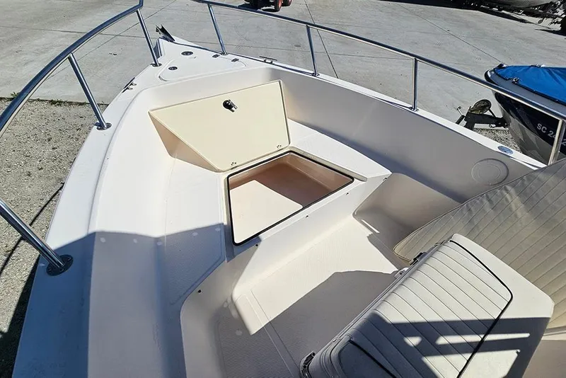 Slide: The Image of Open storage compartment on 2008 Key West 2020 Center Console boat deck. - 16