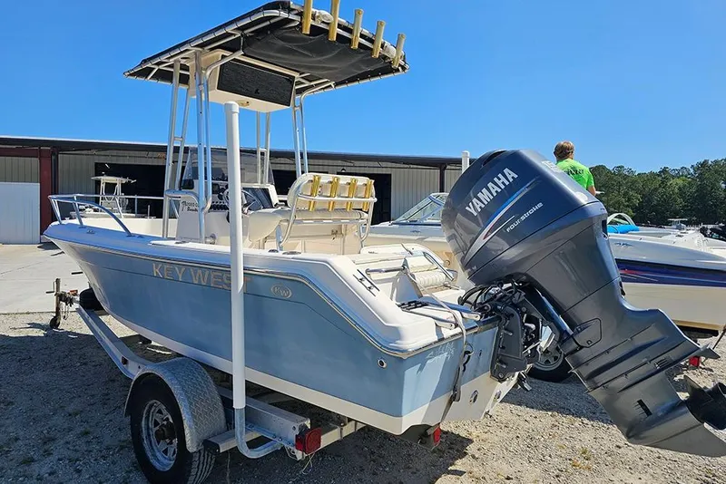 Slide: The Image of Key West 2020 Center Console boat with Yamaha engine on trailer, sunny day. - 3
