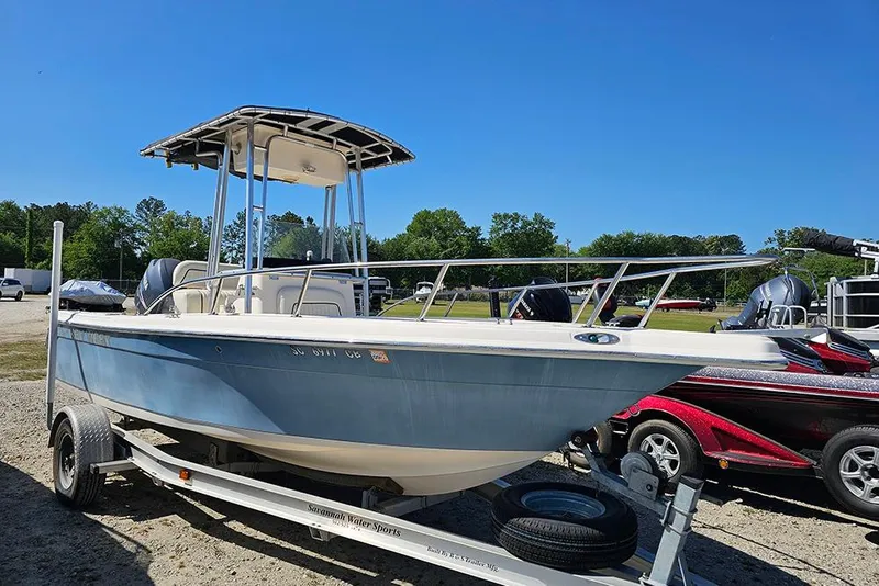 Slide: The Image of Key West 2020 Center Console boat on trailer, sunny day, outdoor setting. - 6