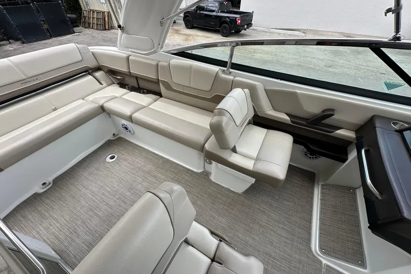 Slide: The Image of 2018 Formula 290 Bowrider interior with beige seating and modern design. - 13