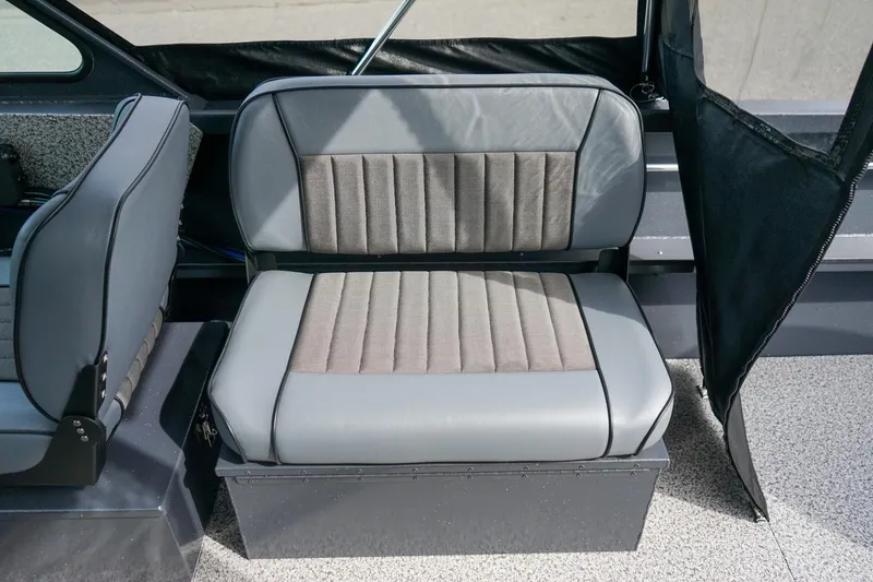 Slide: The Image of 2026 Alumaweld Talon 18 boat seat, gray upholstery, interior view. - 11