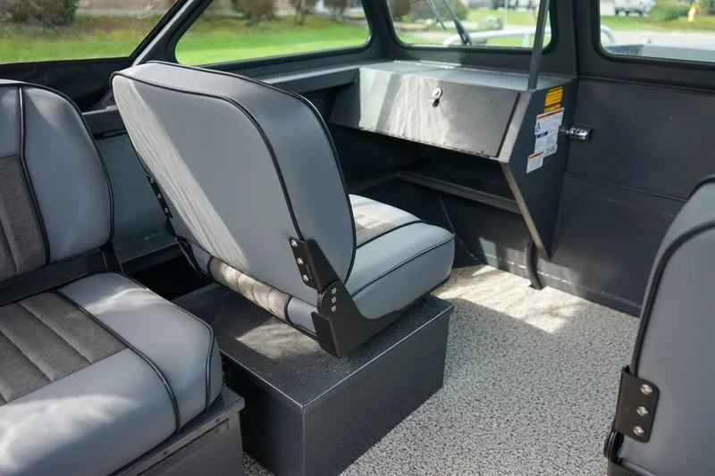 Slide: The Image of Interior of 2026 Alumaweld Talon 18 boat with gray seating and dashboard. - 16