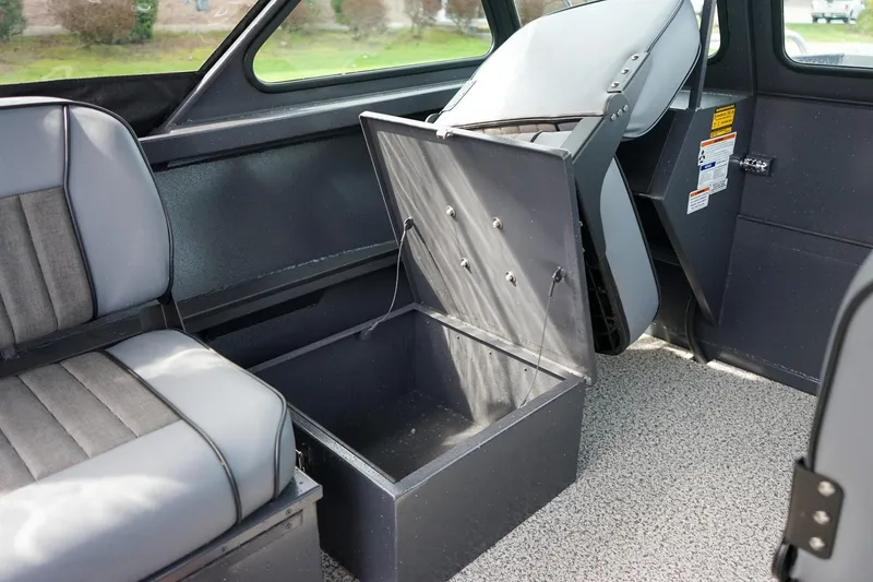 Slide: The Image of Interior of 2026 Alumaweld Talon 18 boat with storage compartment open. - 17