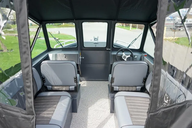 Slide: The Image of Interior of 2026 Alumaweld Talon 18 boat with seating and steering wheel. - 8
