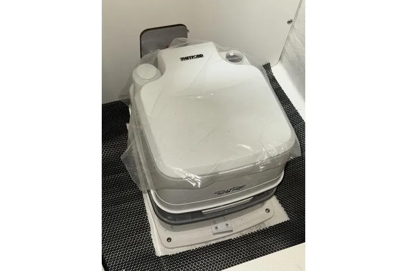 Slide: The Image of Portable toilet in 2026 Robalo R222 Explorer boat cabin. - 21