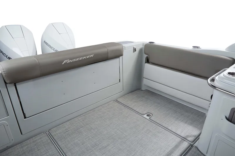 Slide: The Image of 2024 Crownline 280 DC Finseeker boat interior with seating and Mercury engines. - 5