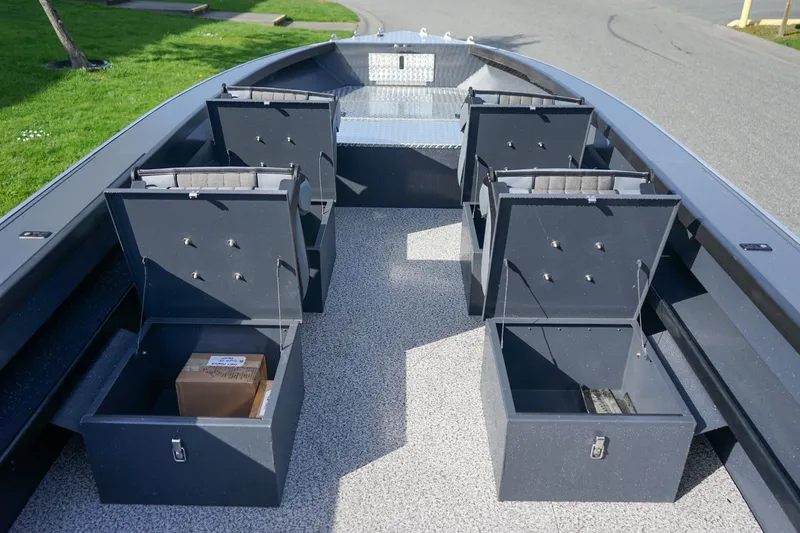 Slide: The Image of 2026 Alumaweld Super Vee Pro 21 boat interior with open storage compartments. - 12
