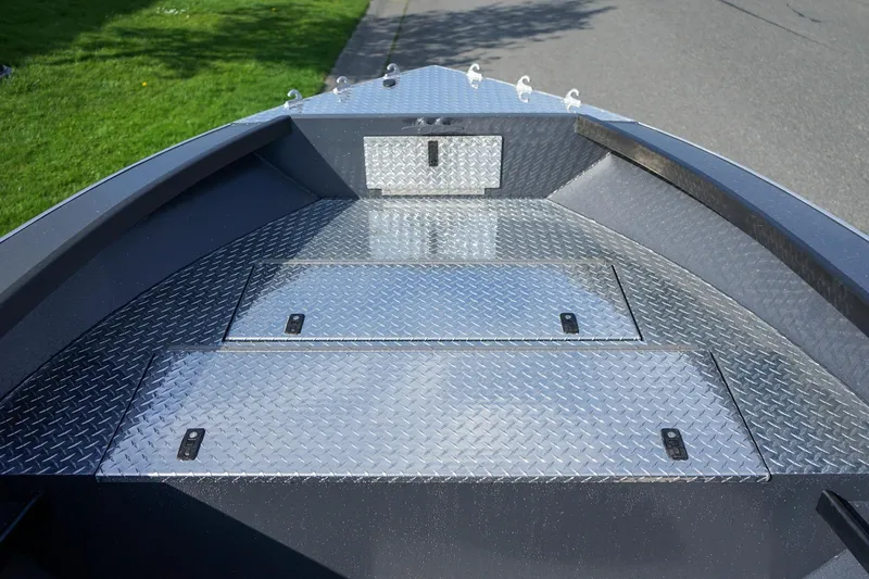 Slide: The Image of 2026 Alumaweld Super Vee Pro 21 boat deck with diamond plate flooring. - 14