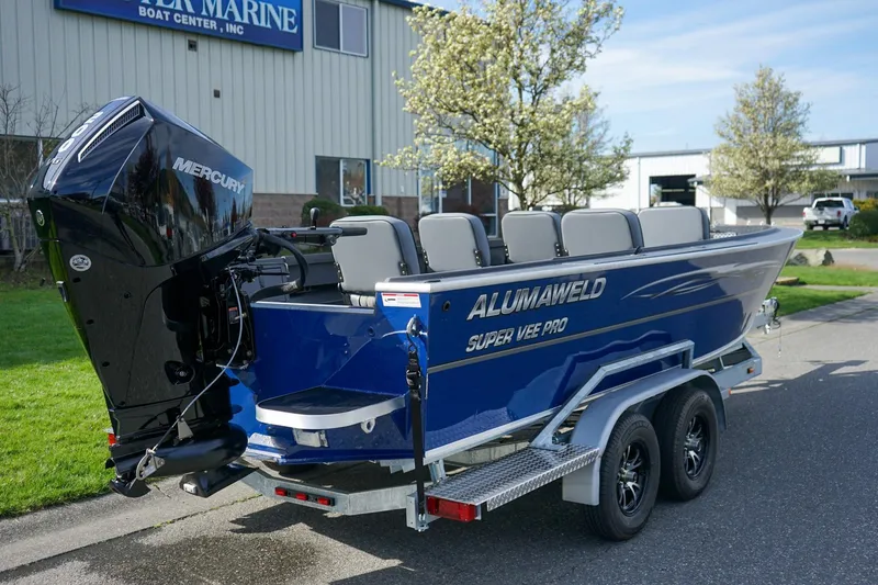 Slide: The Image of 2026 Alumaweld Super Vee Pro 21 boat with Mercury engine on trailer. - 4