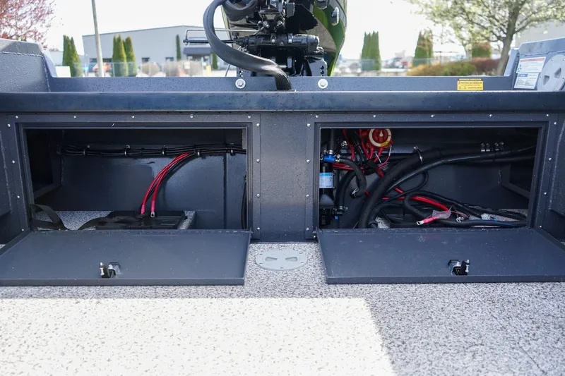 Slide: The Image of 2026 Alumaweld Super Vee Pro 21 boat compartments with wiring and storage. - 8